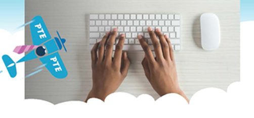 Hands typing on a keyboard at a clean desk